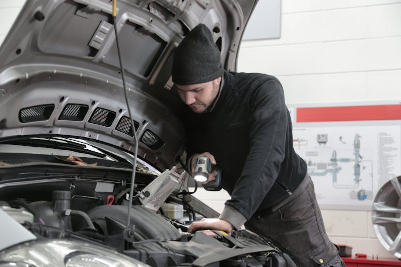 Mechanic working on engine
