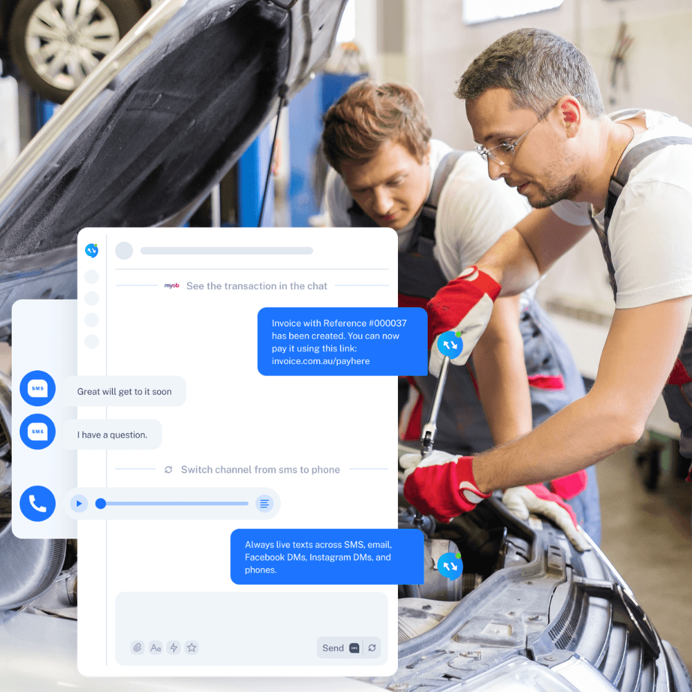 Mechanics working on a vehicle beside a Coax customer conversation